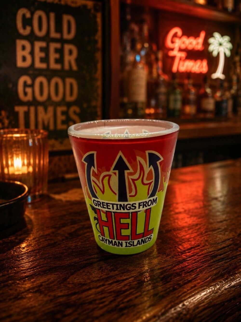 Vintage Greetings From Hell Cayman Islands Shot Glass Souvenir Red Green Flames